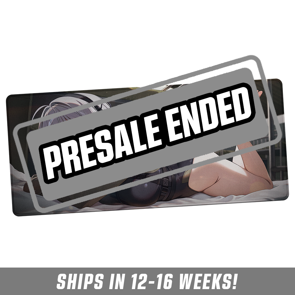 Mouse pad featuring an anime girl with silver hair, red eyes, headset, and black shorts lying on a bed.