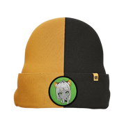Two-tone black and mustard yellow beanie with a folded cuff featuring a green patch of a girl with cat ears and headphones.